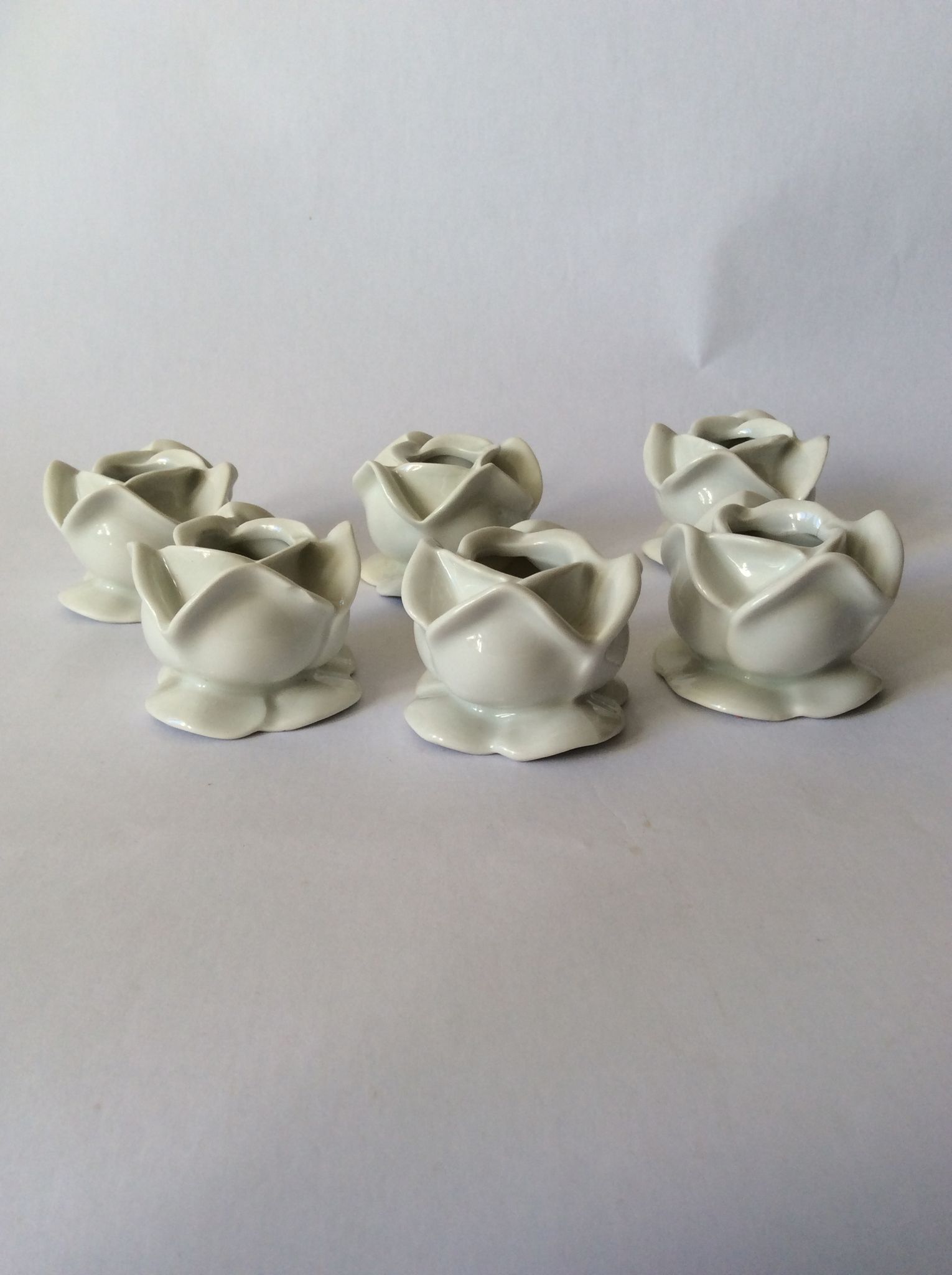 Lot de 6 bougeoirs rose en porcelaine blanche