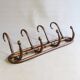 Wall coat rack by Kohn, bent wood 1910, no Thonet.
