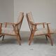 Pair of Boomerang-style armchairs in ecru beige fabric, 1960s.