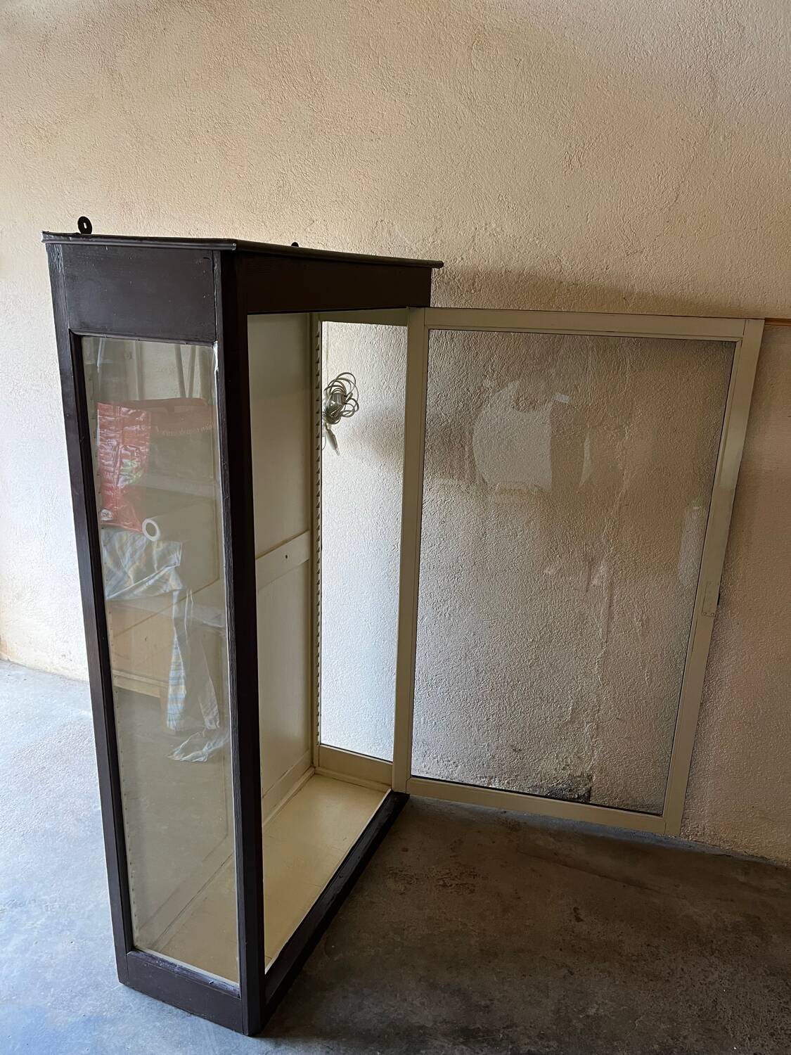 Old wooden glass display case