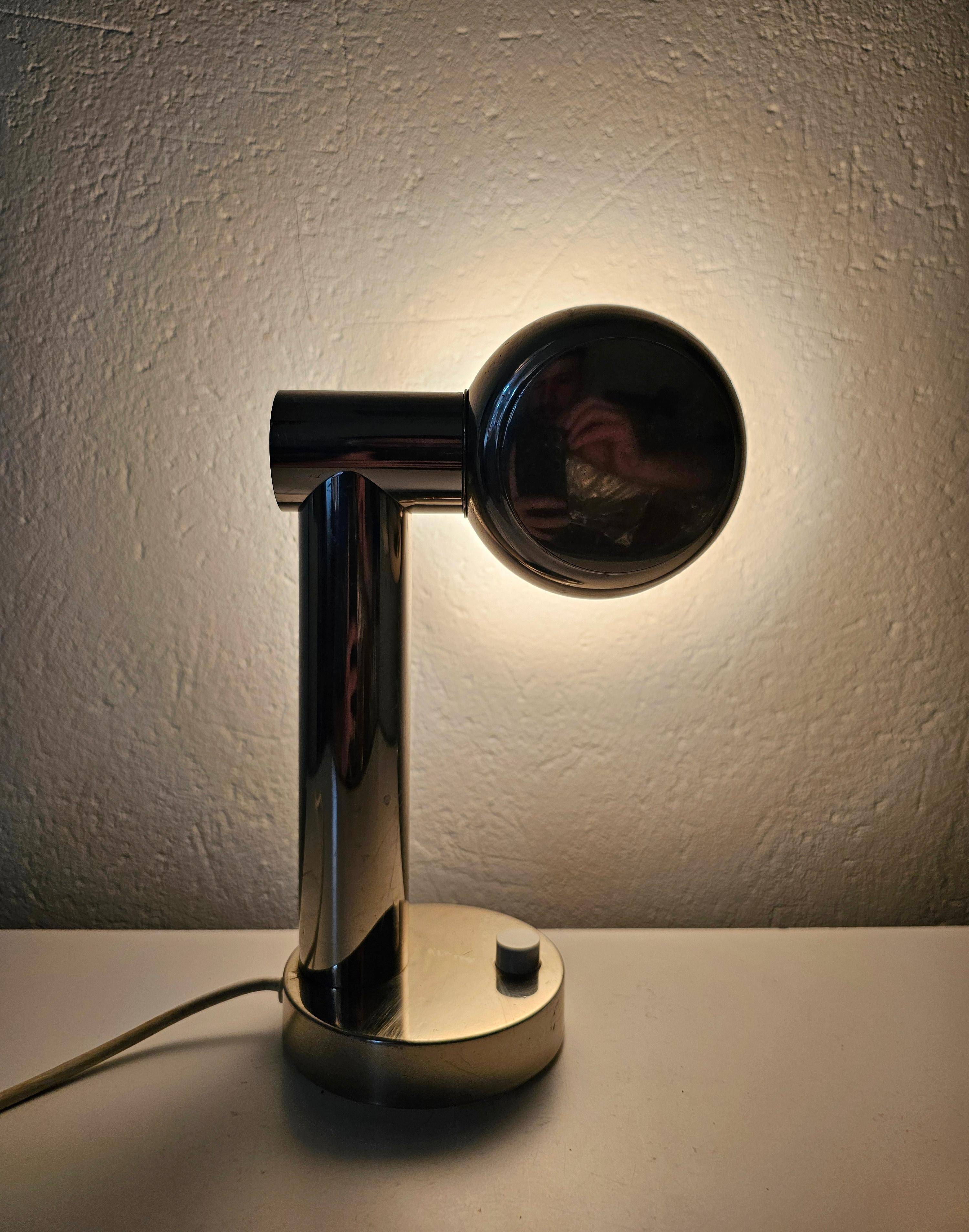 Space Age table lamp in chrome with a swivelling shade, Italy 1970s.