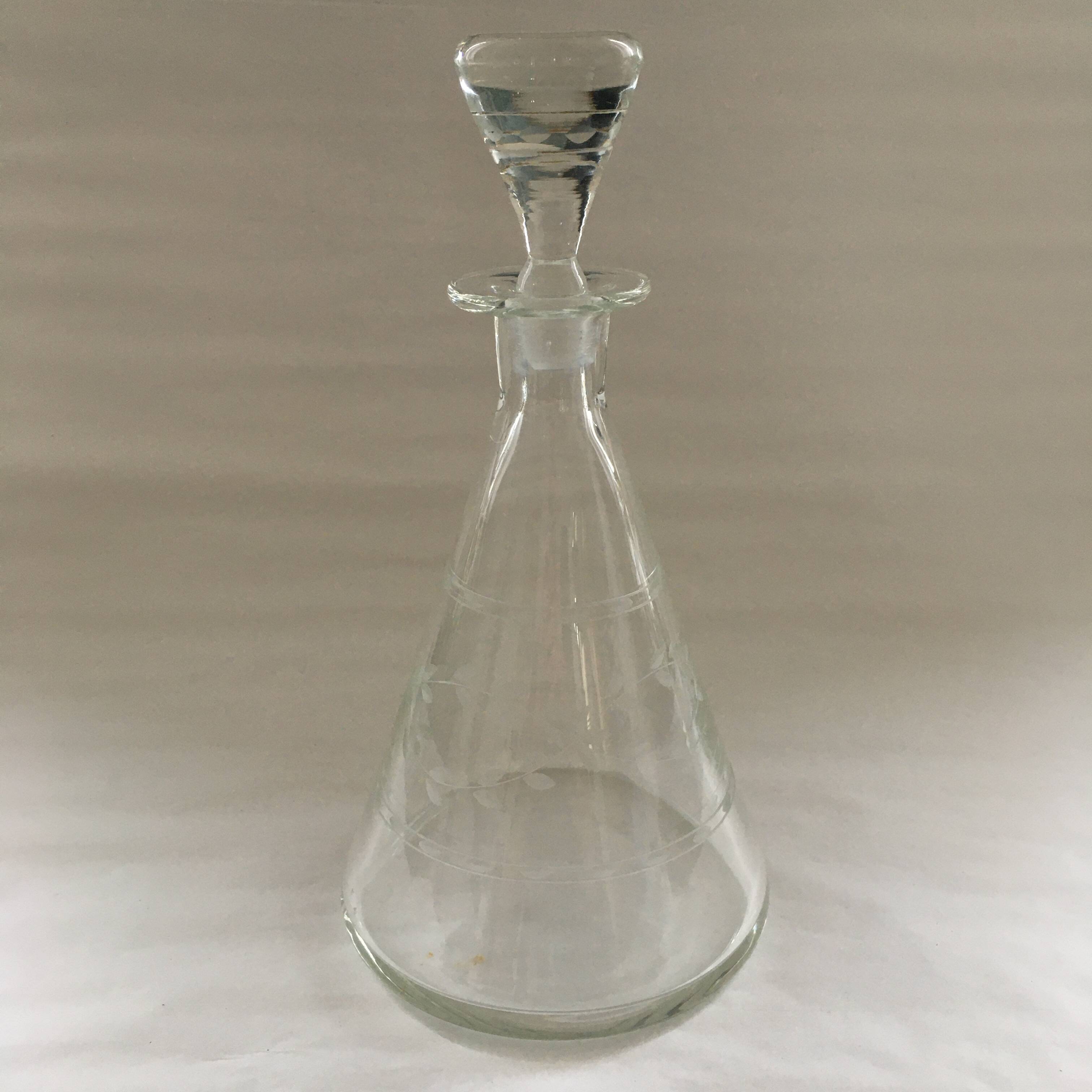 Carafe with chiseled floral decoration