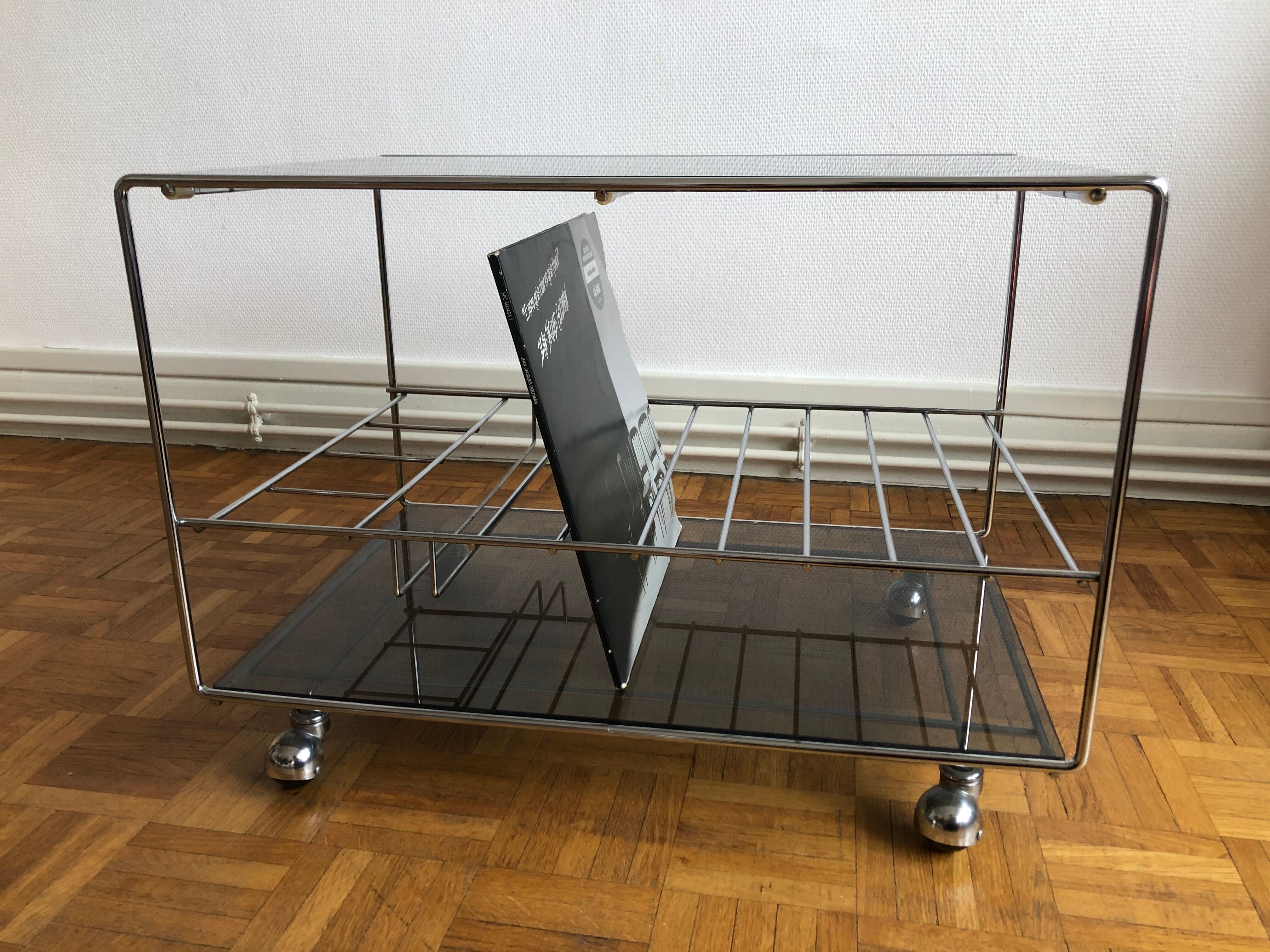 Glass and chrome wheeled vinyl holder