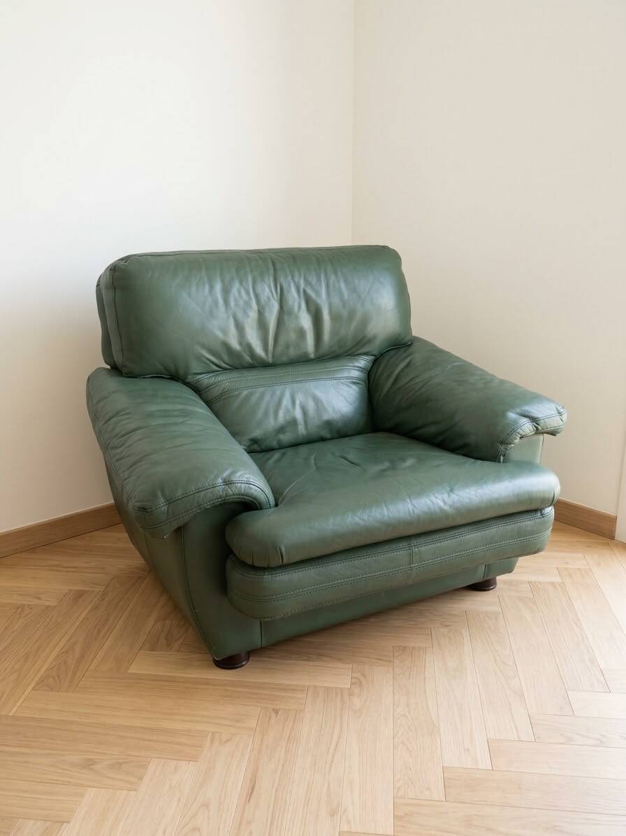 Vintage green leather armchair