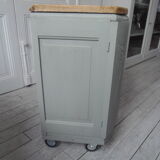 Art Deco furniture revisited in gray green and placed on wheels.