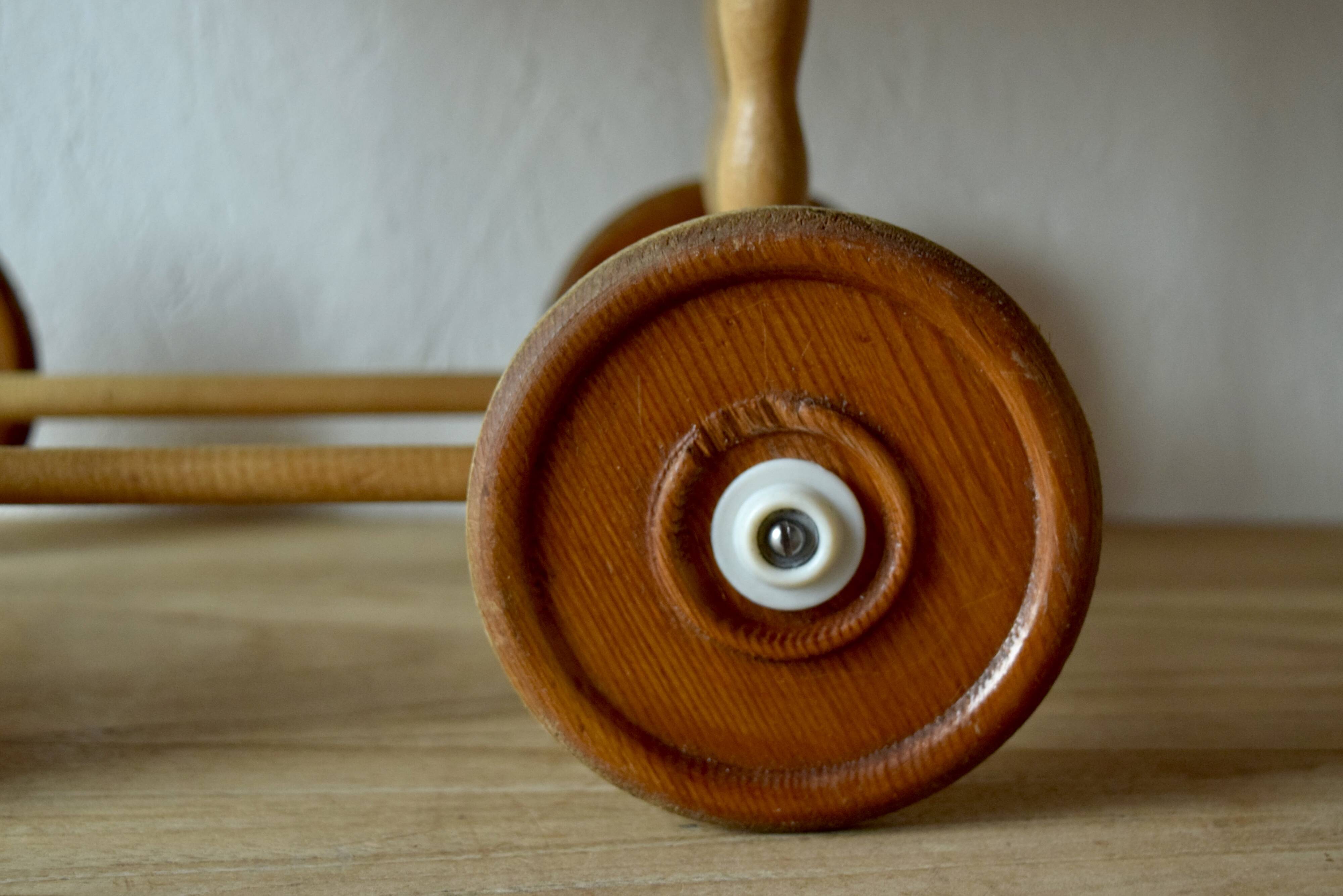 Old dolls pram - wooden wheels