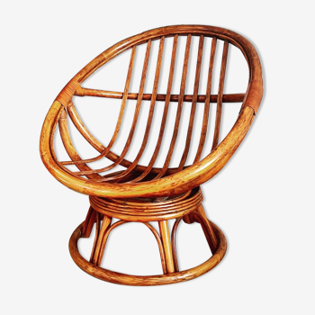 Swivel rattan armchair