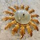 Golden sunburst ceiling chandelier with metal and glass, 1960s