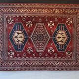 Wall rug with oriental patterns.
