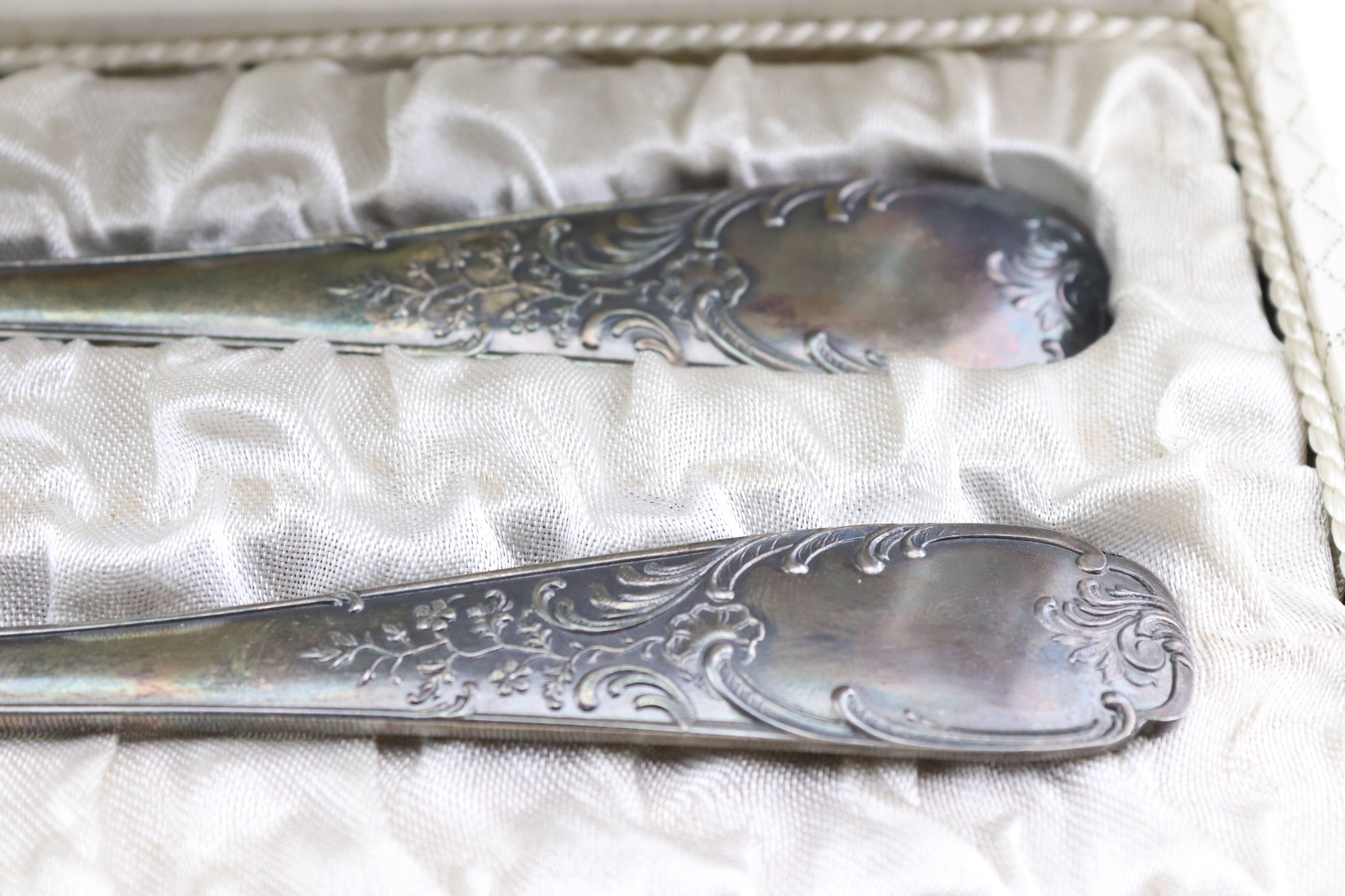 Old covered box in silver or silver metal spoon and fork with hallmarks