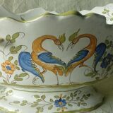 Moustiers earthenware planter with ram's head