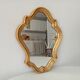Baroque mirror in gilded wood from the 1960s.