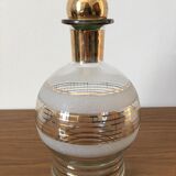 Glass carafe with white granite parts and gold edging. Glass stopper