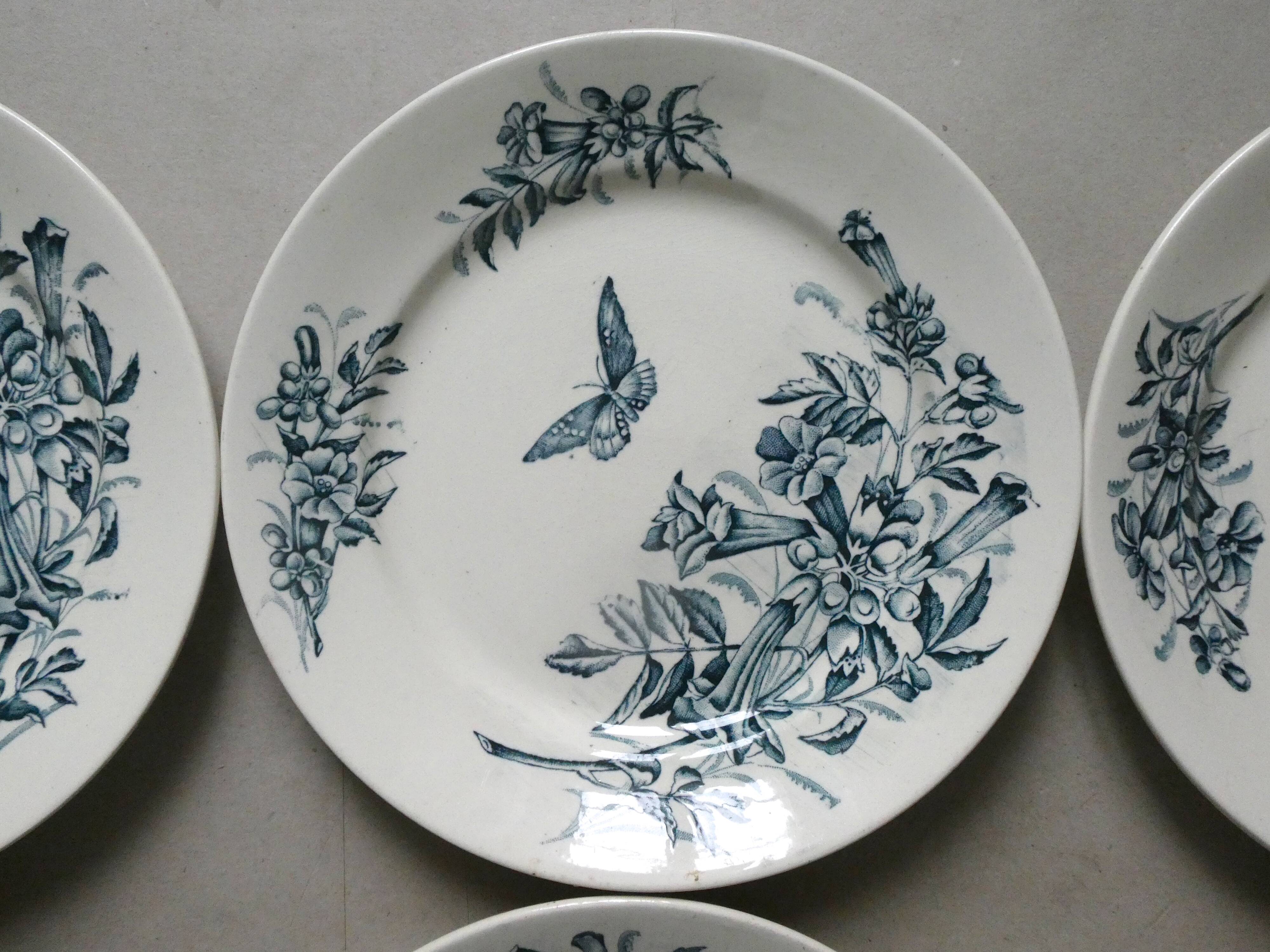 6 assiettes plates Badonviller, papillons et fleurs, 1900
