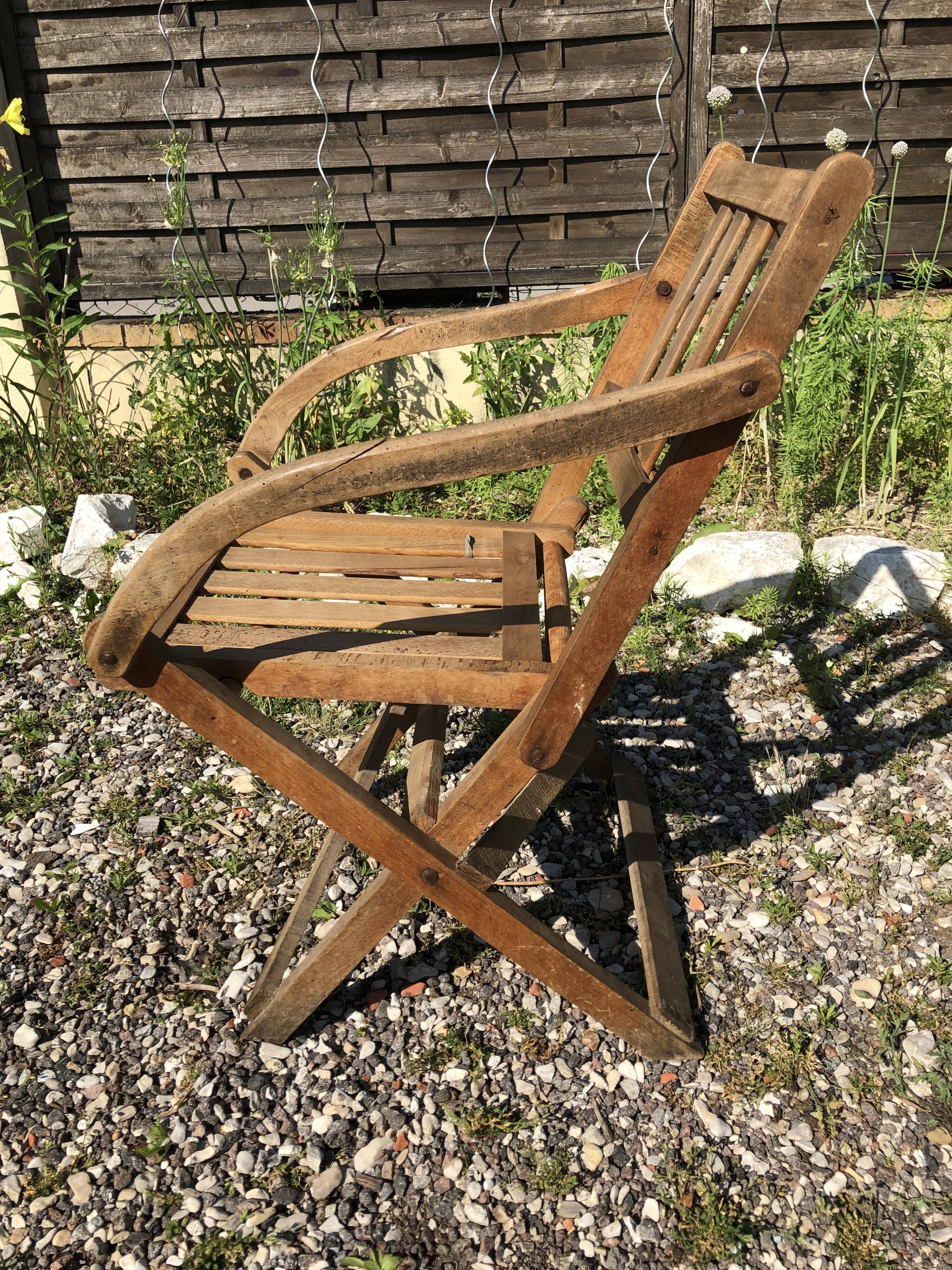 Old folding armchair wooden sitting vintage