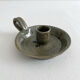 Vintage glazed stoneware hand candlestick