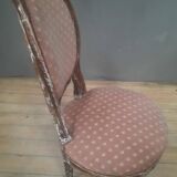 Chaise basse de style Louis XVI