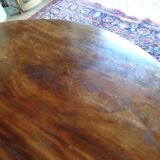 Nineteenth round table in carved mahogany with extension Ø 133 cm