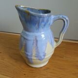 Pastel blue pitcher signed