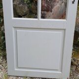Old wooden door with small squares
