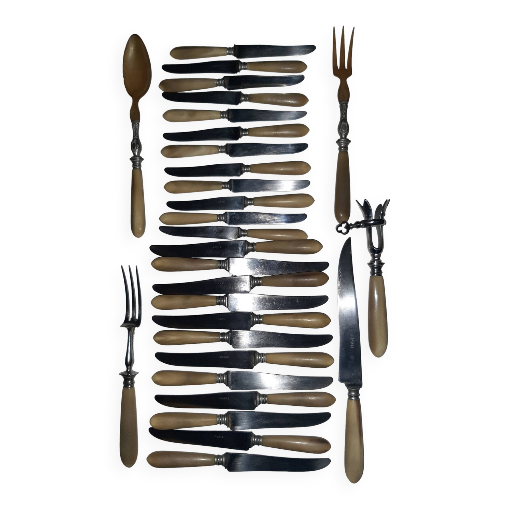29-piece horn cutlery set, knives and serving utensils.