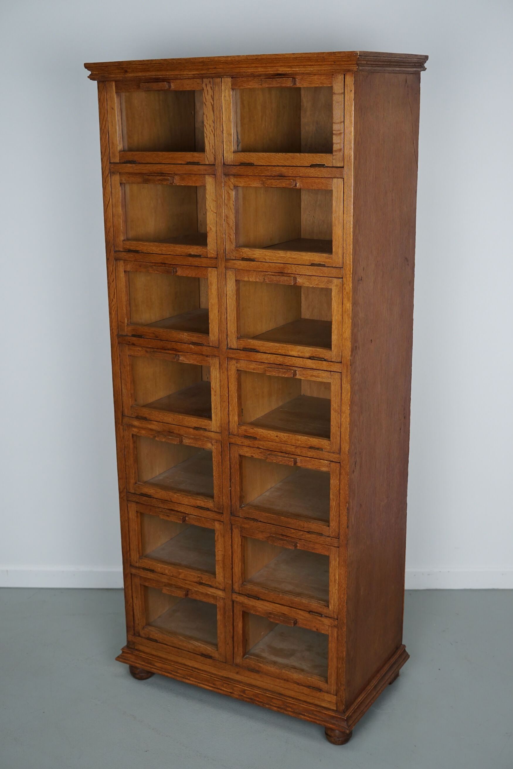 Vintage dutch oak haberdashery shop cabinet / vitrine drop down doors, 1930s
