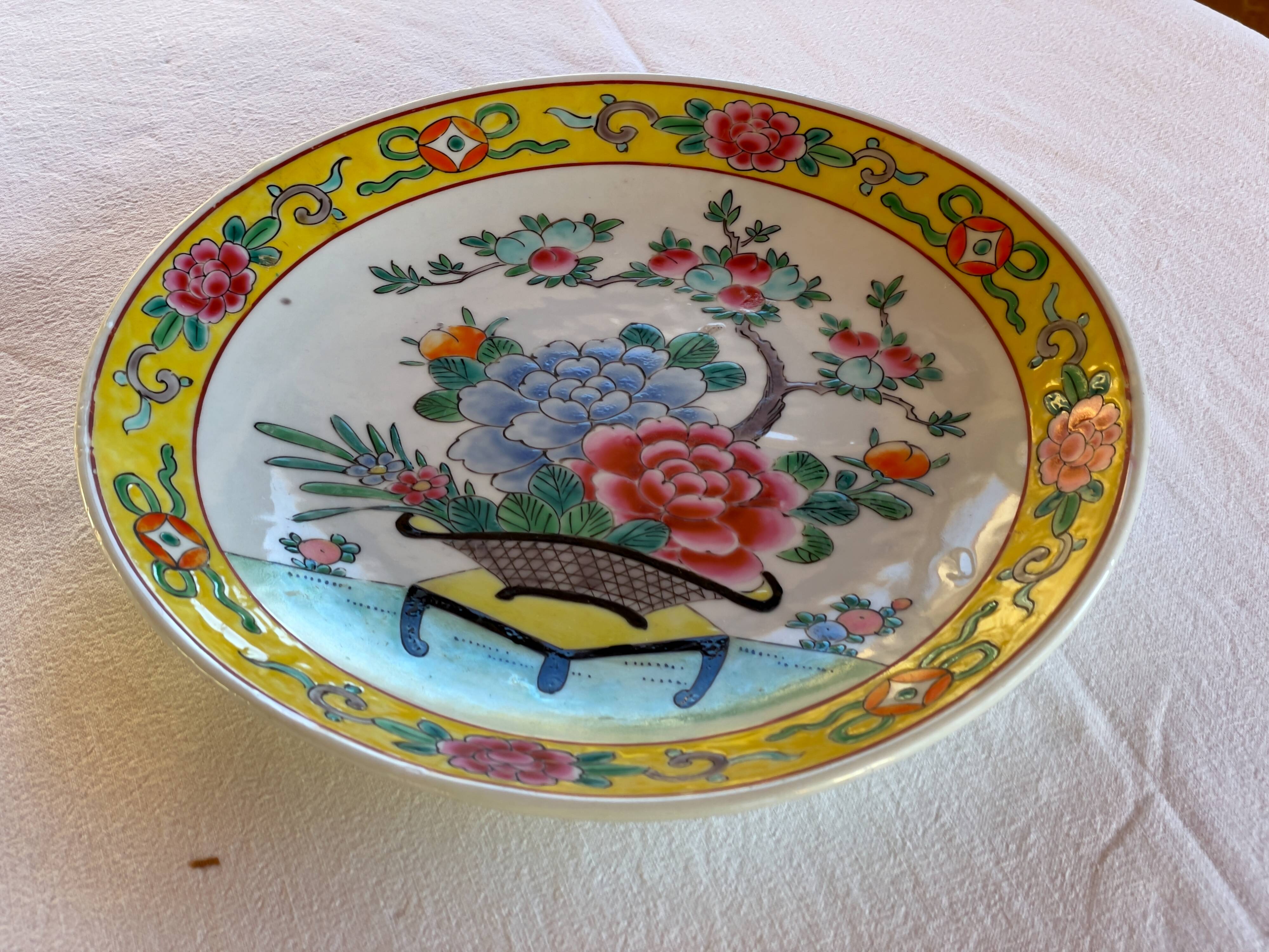 Yellow porcelain plate with saturated and vivid colors. Handmade in Japan