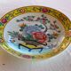 Yellow porcelain plate with saturated and vivid colors. Handmade in Japan