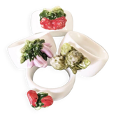 Lot de 4 ronds de serviette en barbotine.