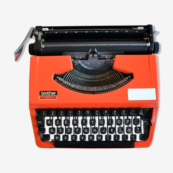 Orange typewriter brother 210 - 1970