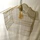 Golden birdcage suspension