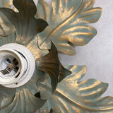 Metal flower sconce