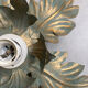 Metal flower sconce