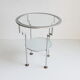 Postmodern round glass  and steel side table, 1980s.