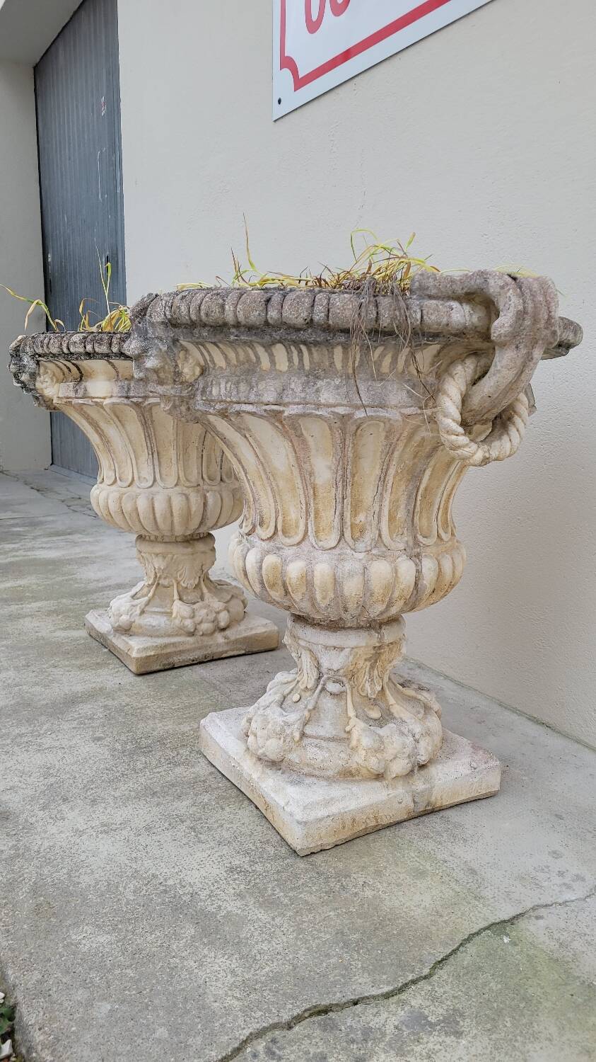 Pair of planter vases decorated with faces in reconstituted stone 1950s