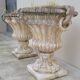 Pair of planter vases decorated with faces in reconstituted stone 1950s