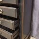 Cherry wood chest of drawers with 5 drawers in aged black.