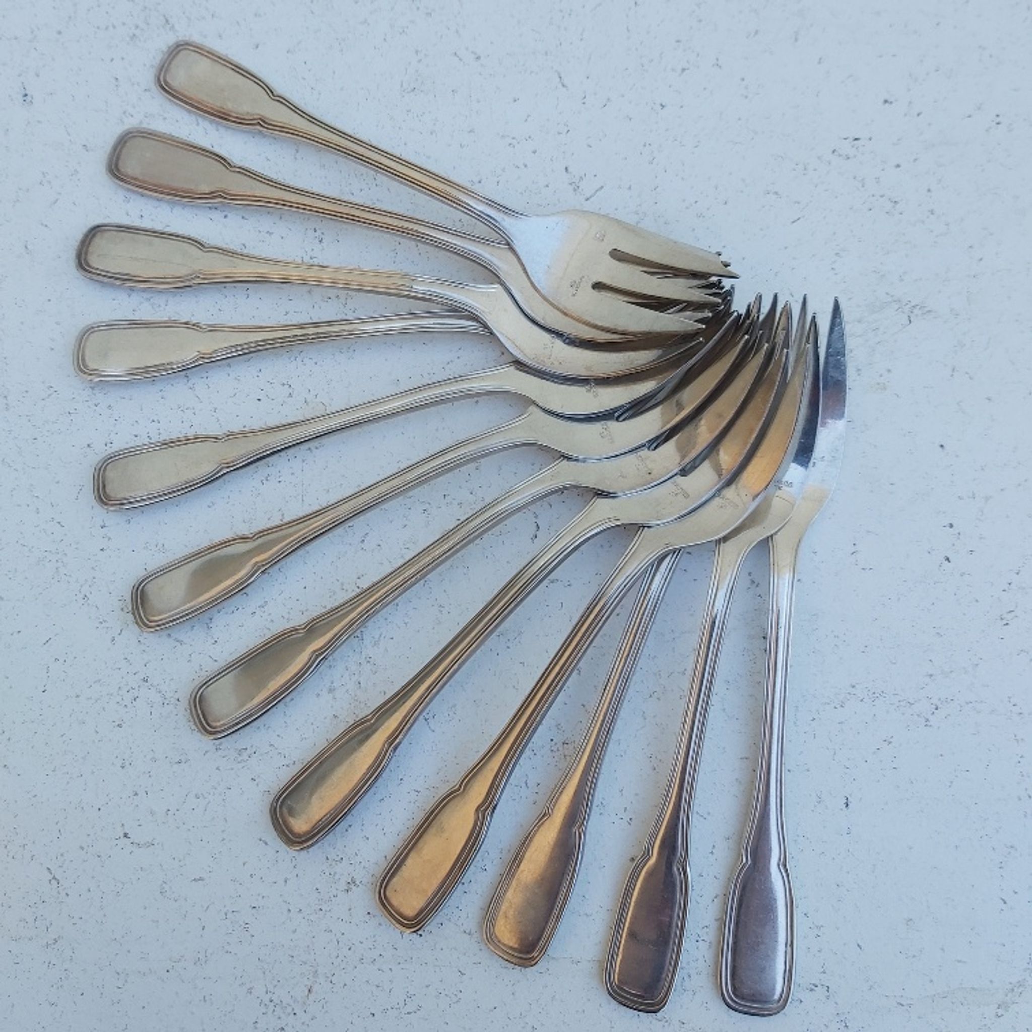 Set de 12 fourchettes à huitres ercuis en métal argenté