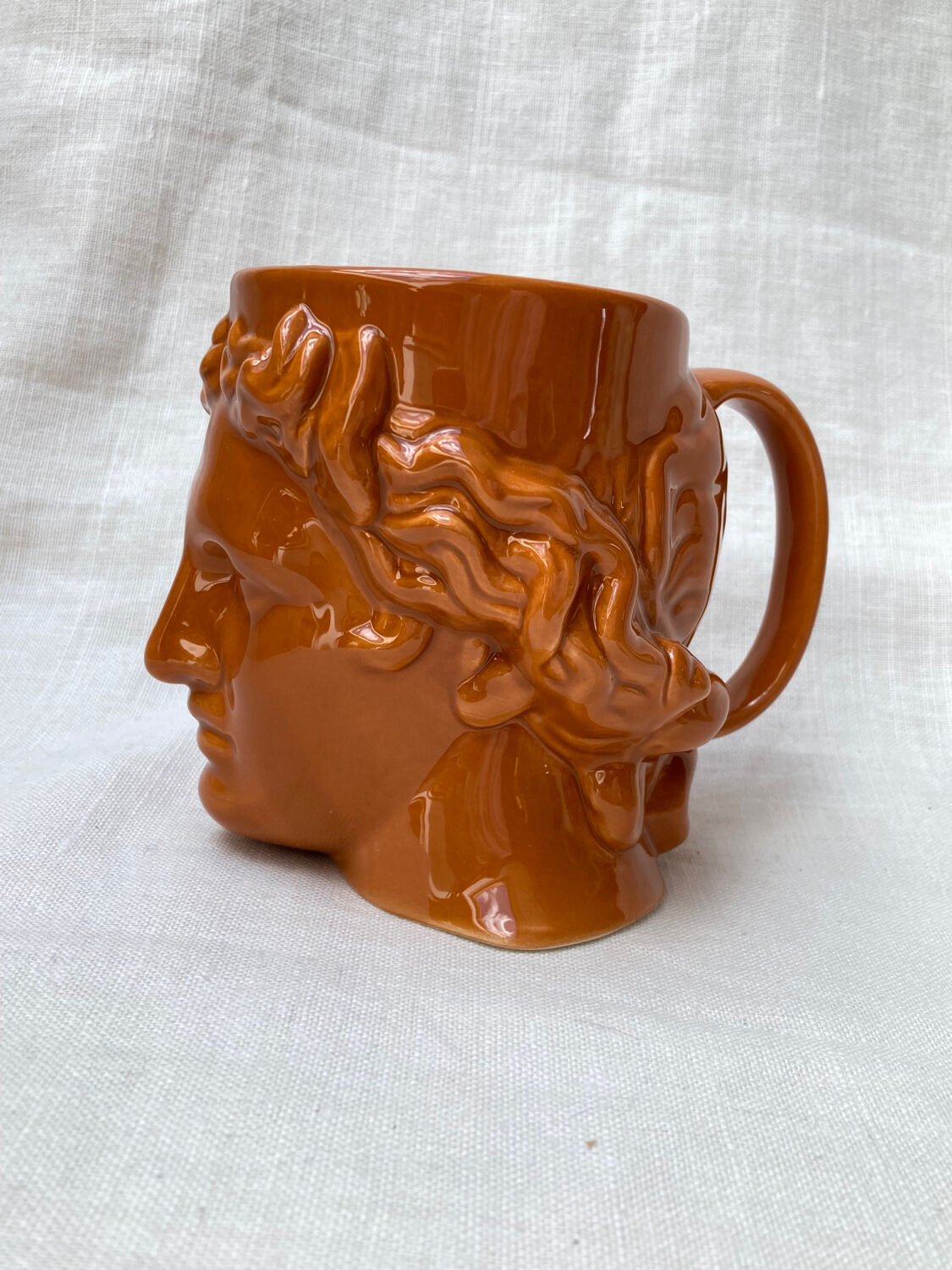 Roman head cup