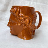Roman head cup