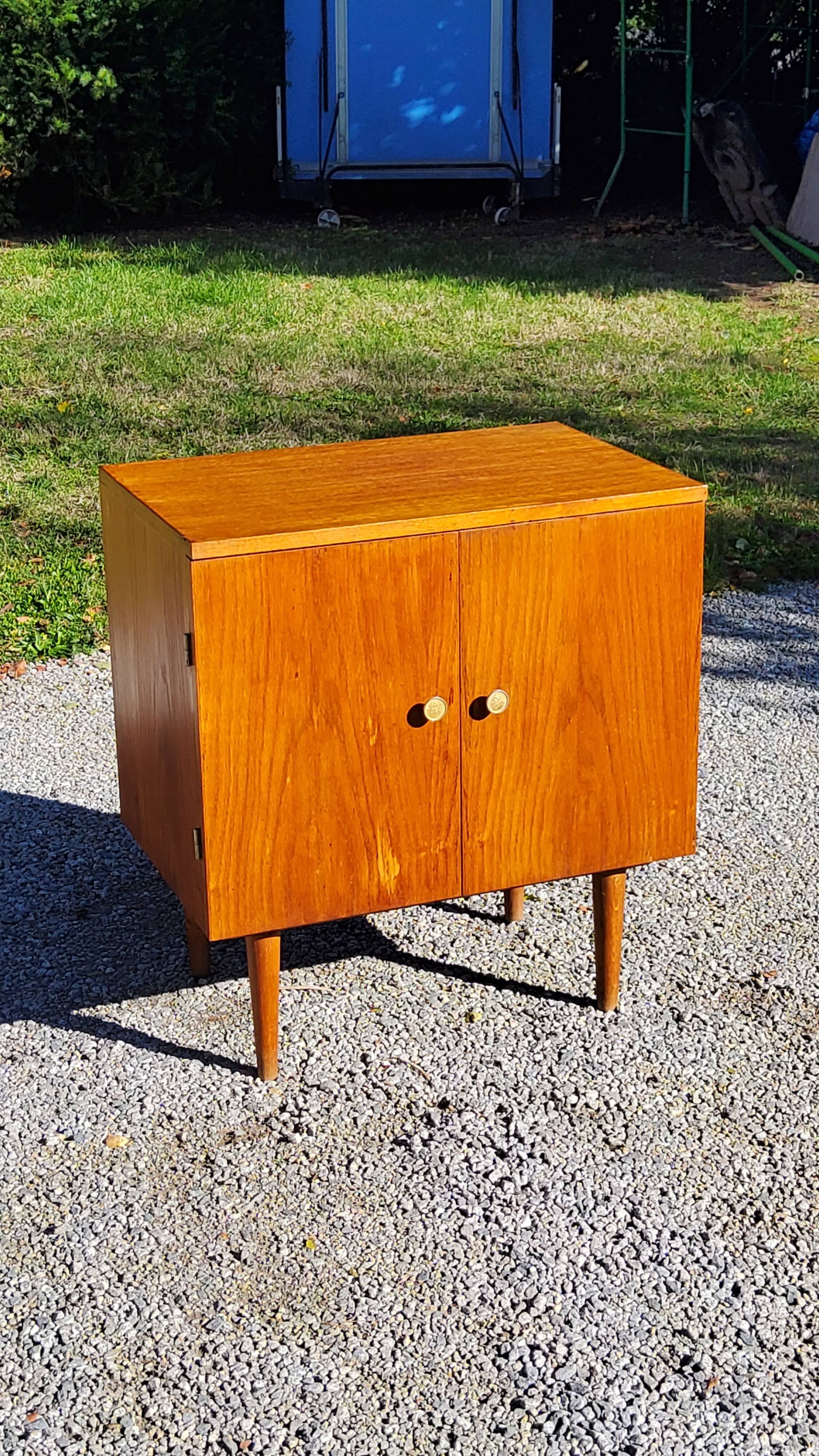 Vintage golden oak sideboard with conical legs from the 1950s
