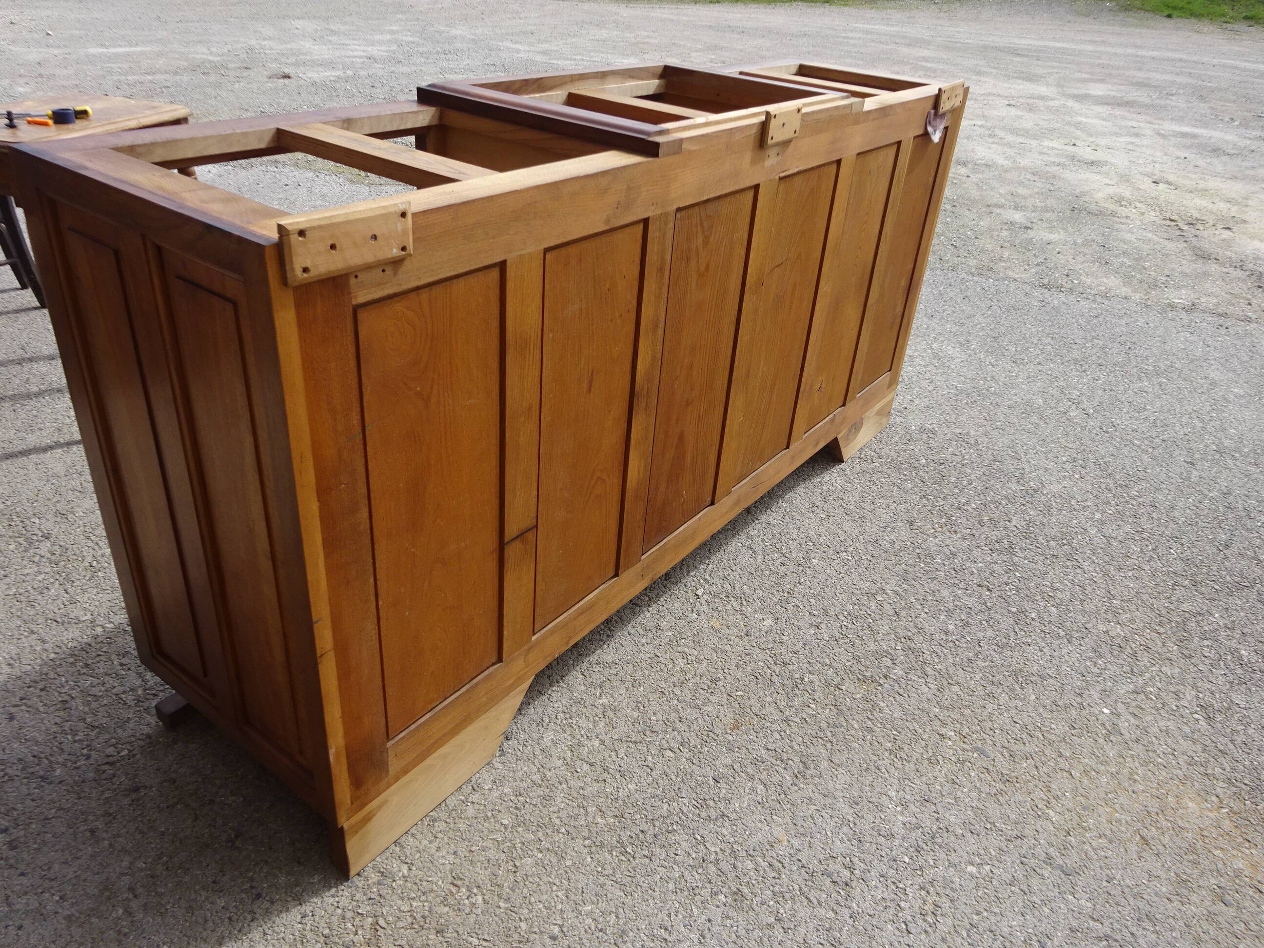 Solid walnut sideboard, moustache legs, black marble top.