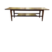 Scandinavian coffee table in teak with double top.