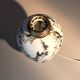 Fine porcelain lamp painted and gilded with fine gold. Laure Selignac, Paris.