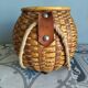 Wicker/rattan basket with handles