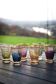 A vintage liqueur service in coloured and gold glass from the 1960s.