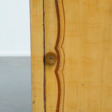 Antique wooden 1-door hallway/nightstand with a light marble top