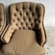 Pair of upholstered lounge chairs with ottoman, 1970s