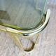 Gold metal and smoked glass coffee table – 1970s-624001