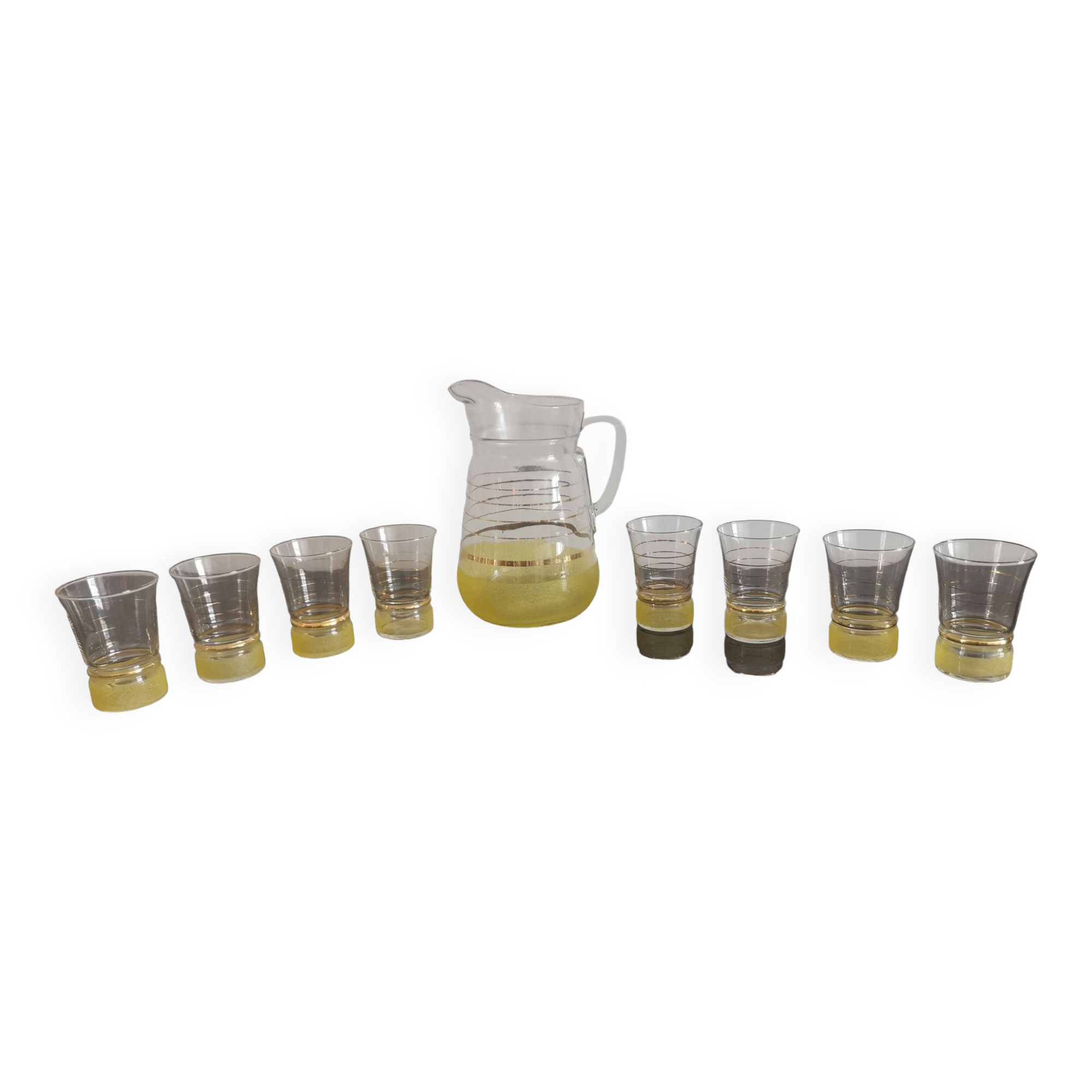 Old pitcher with its 8 yellow granite glasses with gold edging vintage 50's
